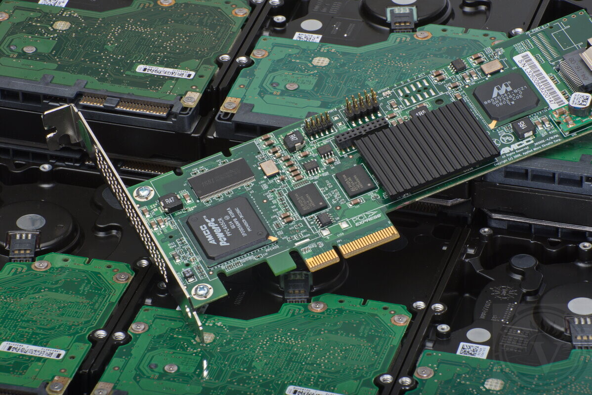 Data recovery specialist handling a hard drive in our laboratory