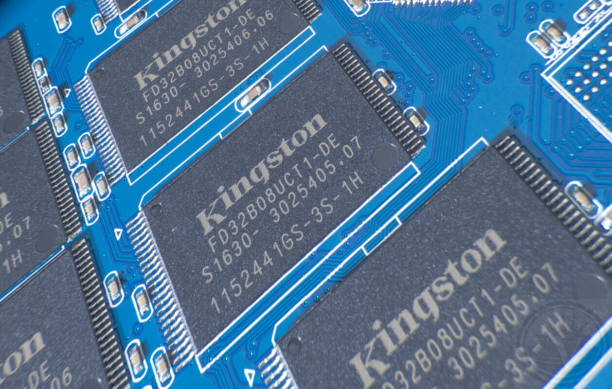 Data recovery specialist handling a hard drive in our laboratory